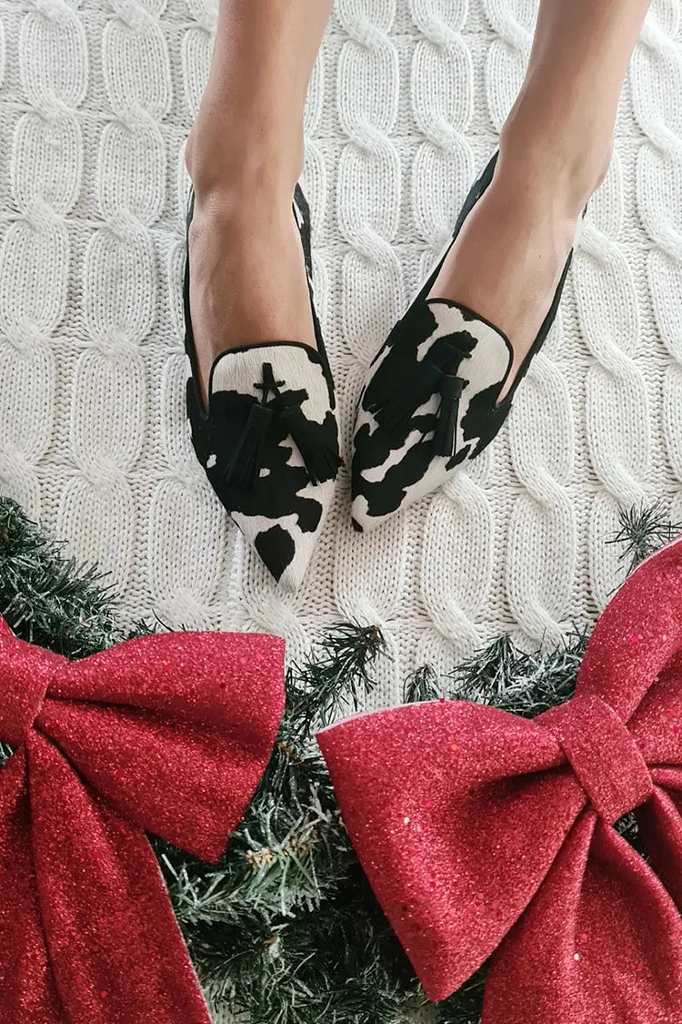 Loafer mit Kuhmuster und Quaste