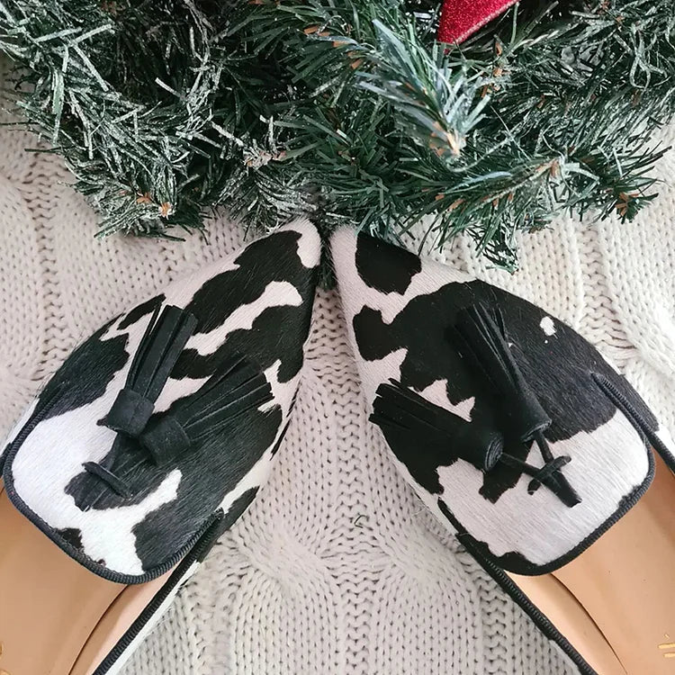 Loafer mit Kuhmuster und Quaste